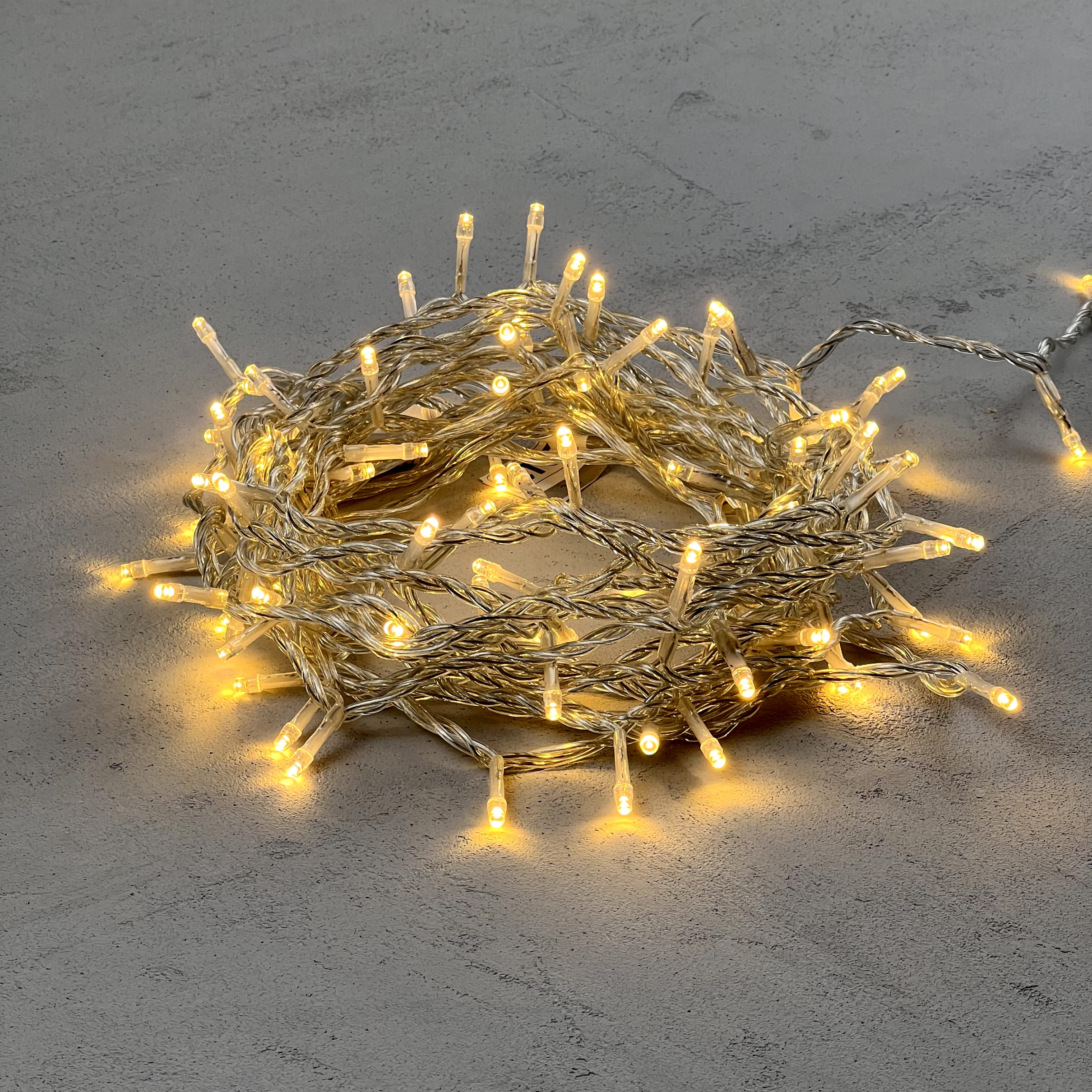 Гирлянда Нить 10м Тепло-Белая 24В, 100 LED, Провод Прозрачный ПВХ, IP54 PST100-10-1WW