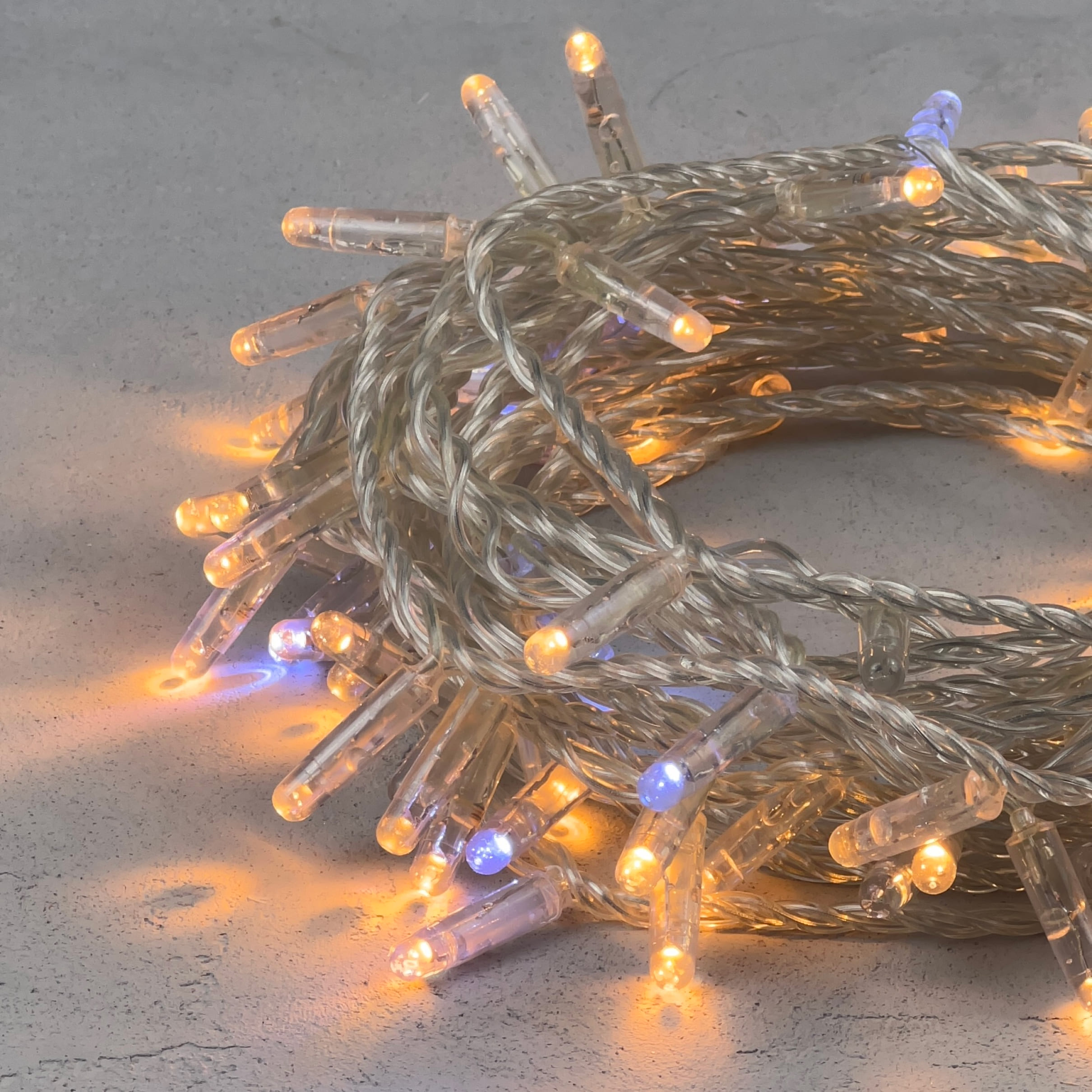 Гирлянда Нить с Колпачком 10м Экстра Тепло-Белая с Мерцанием Белого Диода 220В, 100 LED, Провод Проз LTC PST100BLWCAP-10-2EWW PST100BLWCAP-10-2EWW