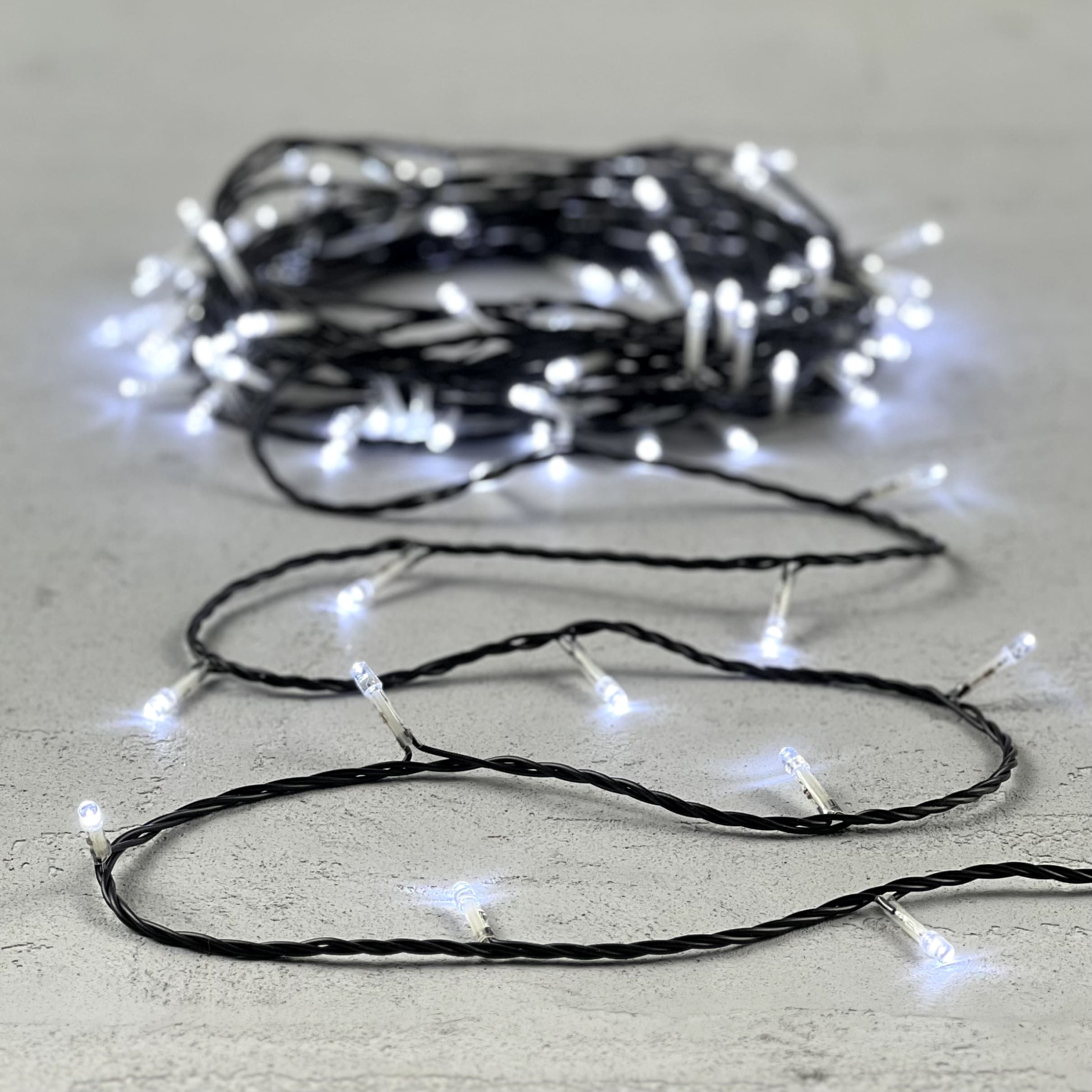 Гирлянда Нить с Контроллером 10м Белая 220В, 100 LED, Провод Черный ПВХ, IP20 PST100F8-11-2W