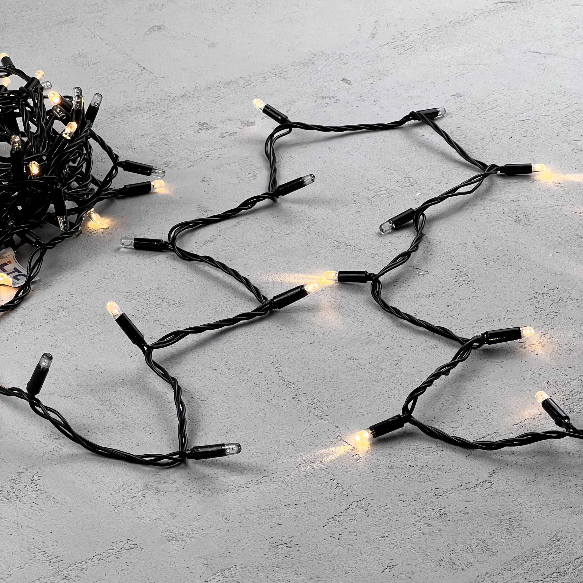 Гирлянда LTC Нить с Колпачком 10м Тепло-Белая с Мерцанием Каждого Диода 24В, 100 LED PST100ABLCAP-11-1WW