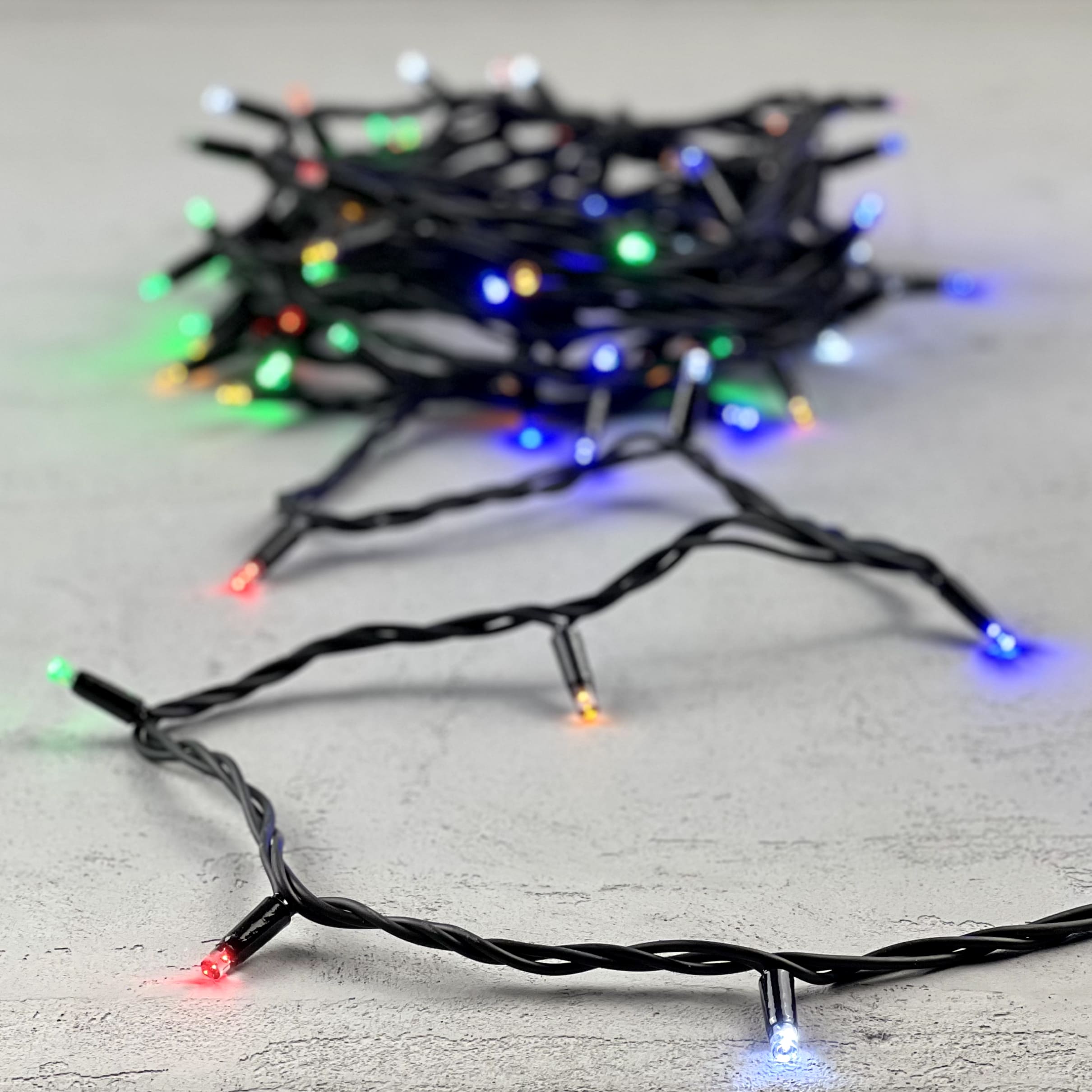 Гирлянда Нить 10м Разноцветная с Мерцанием Белого Диода 220В, 75 LED, Провод Черный Каучук, IP65 LL75BLW-1-2M
