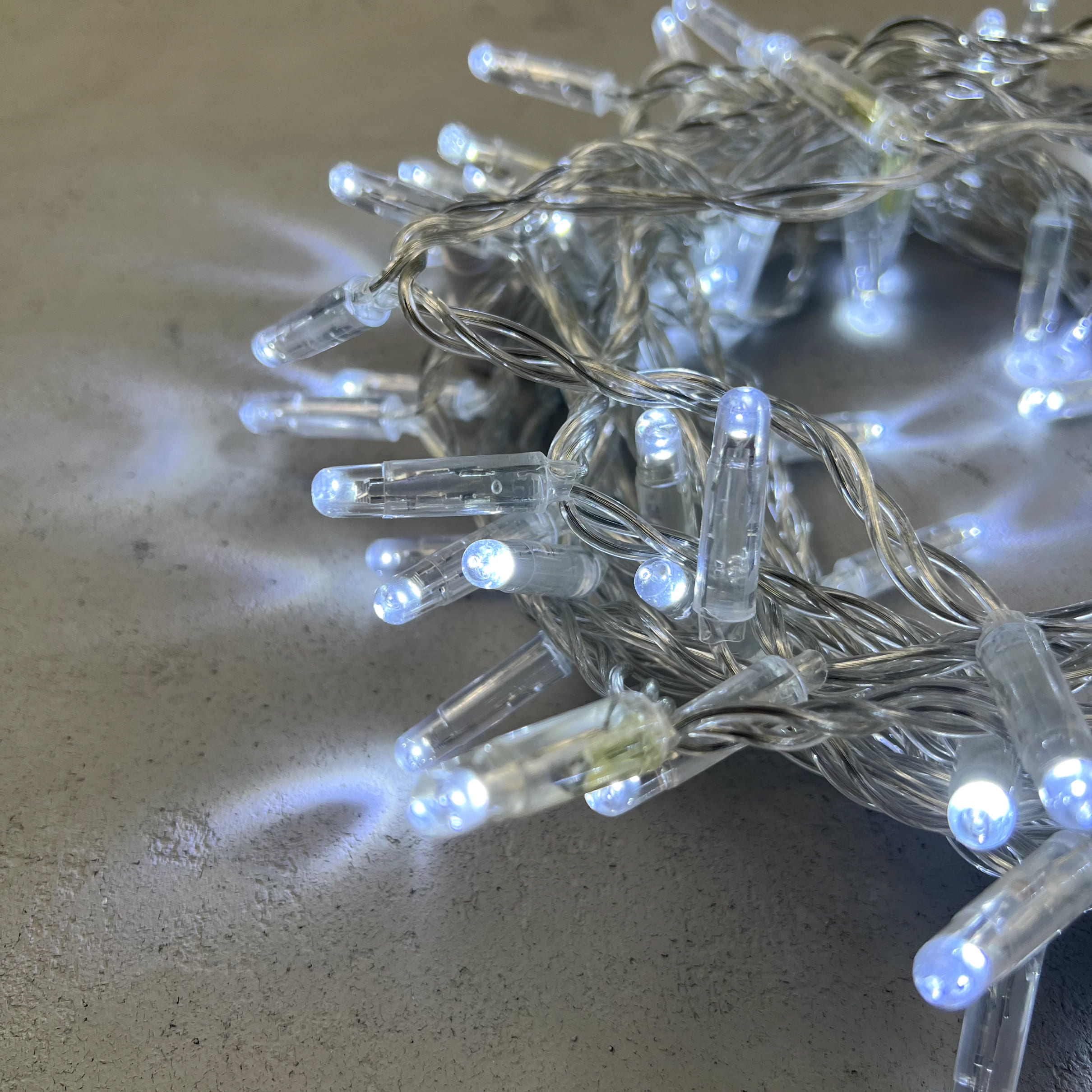 Гирлянда Нить с Колпачком 10м Белая 220В, 100 LED, Провод Прозрачный ПВХ, IP65 PST100CAP-10-2W