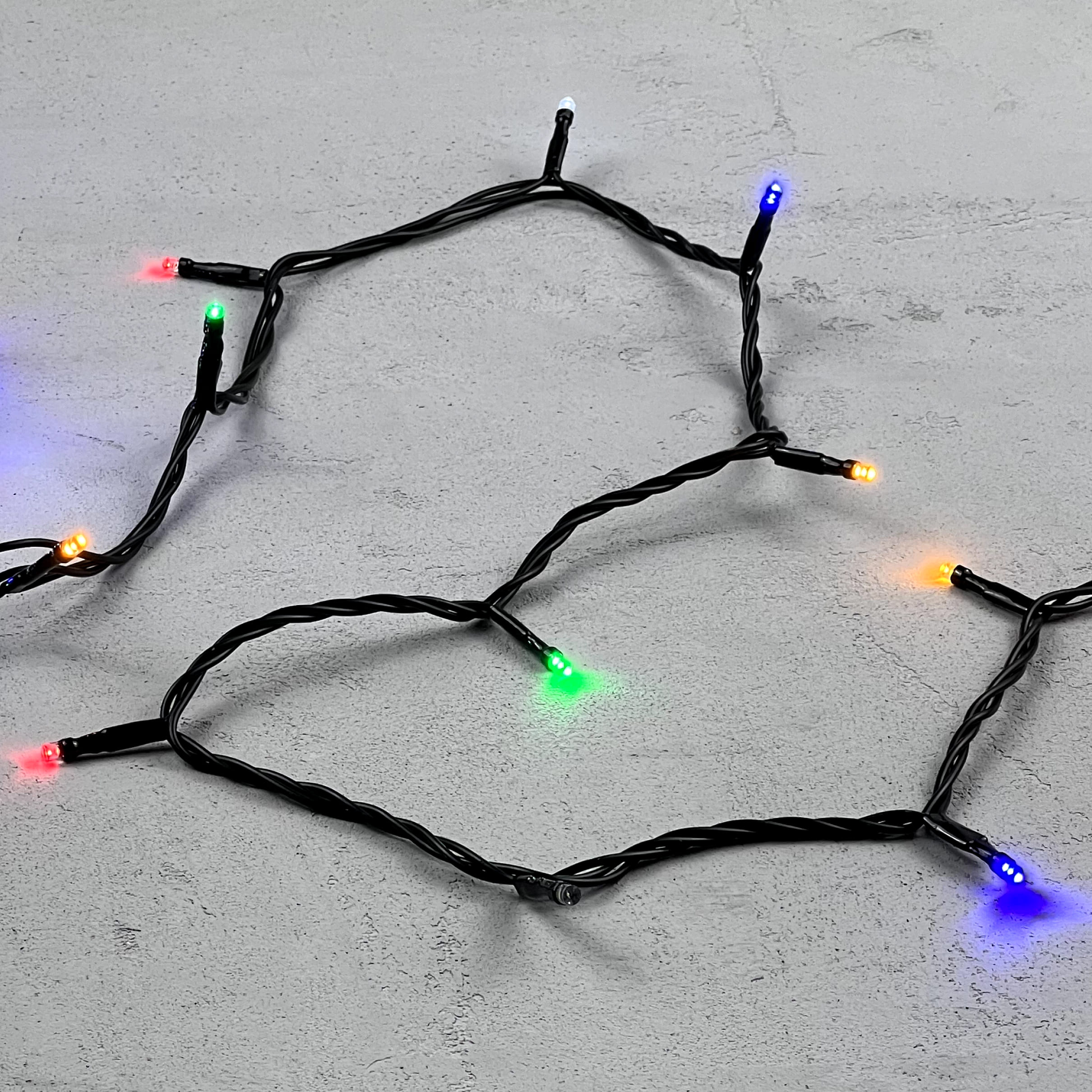 Гирлянда Нить 10м Разноцветная с Мерцанием Белого Диода 24В, 100 LED, Провод Черный ПВХ, IP54 PST100BLW-11-1M