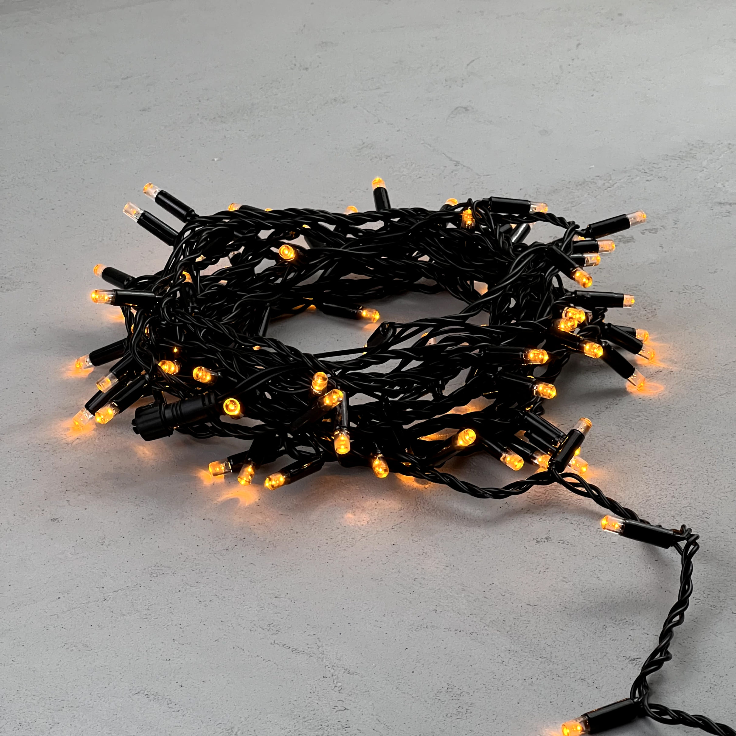 Гирлянда Нить с Колпачком 10м Желтая 24В, 100 LED, Провод Черный ПВХ, IP65 PST100CAP-11-1Y