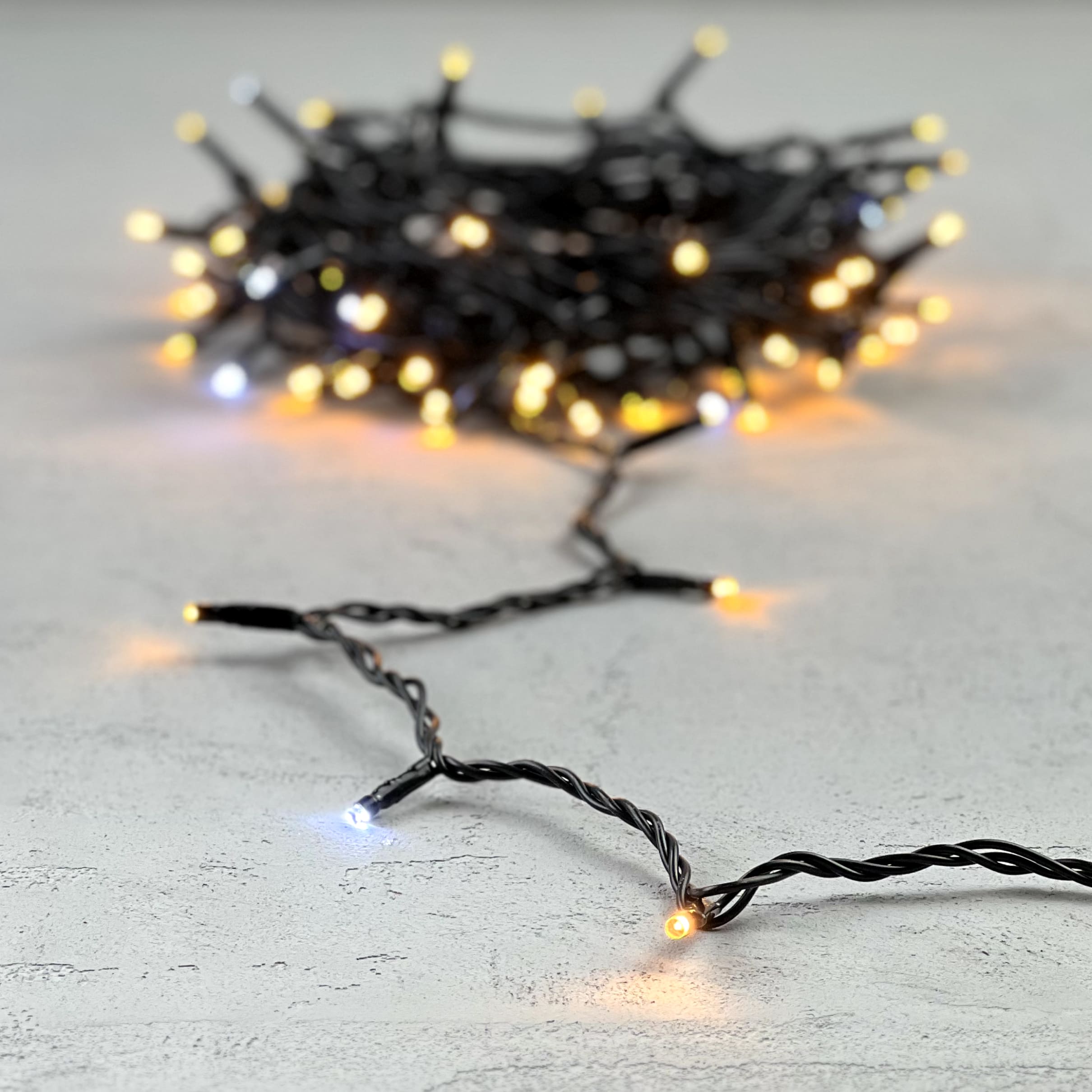 Гирлянда LTC Нить 10м Экстра Тепло-Белая с Мерцанием Белого Диода 24В, 100 LED PST100BLW-11-1EWW