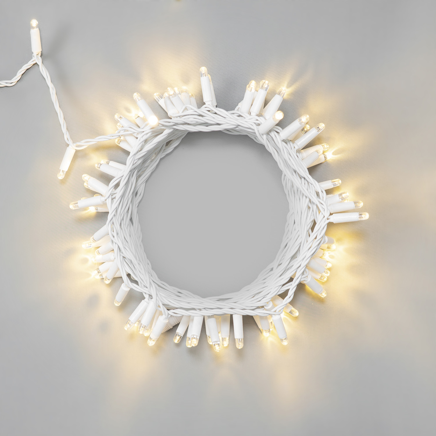 Гирлянда Нить 10м Тепло-Белая 24В, 100 LED, Провод Белый Каучук 2,3мм, IP65 LTC ECO100-8-1WW