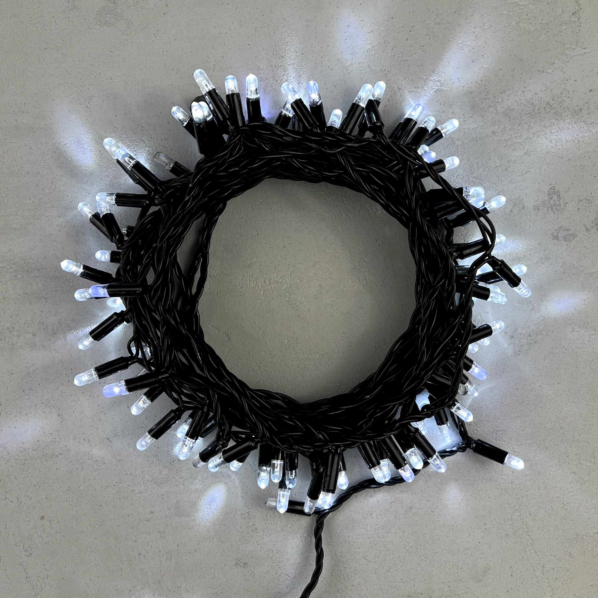 Гирлянда Нить с Колпачком 10м Белая с Мерцанием Белого Диода 24В, 100 LED, Провод Черный ПВХ, IP65 PST100BLWCAP-11-1W