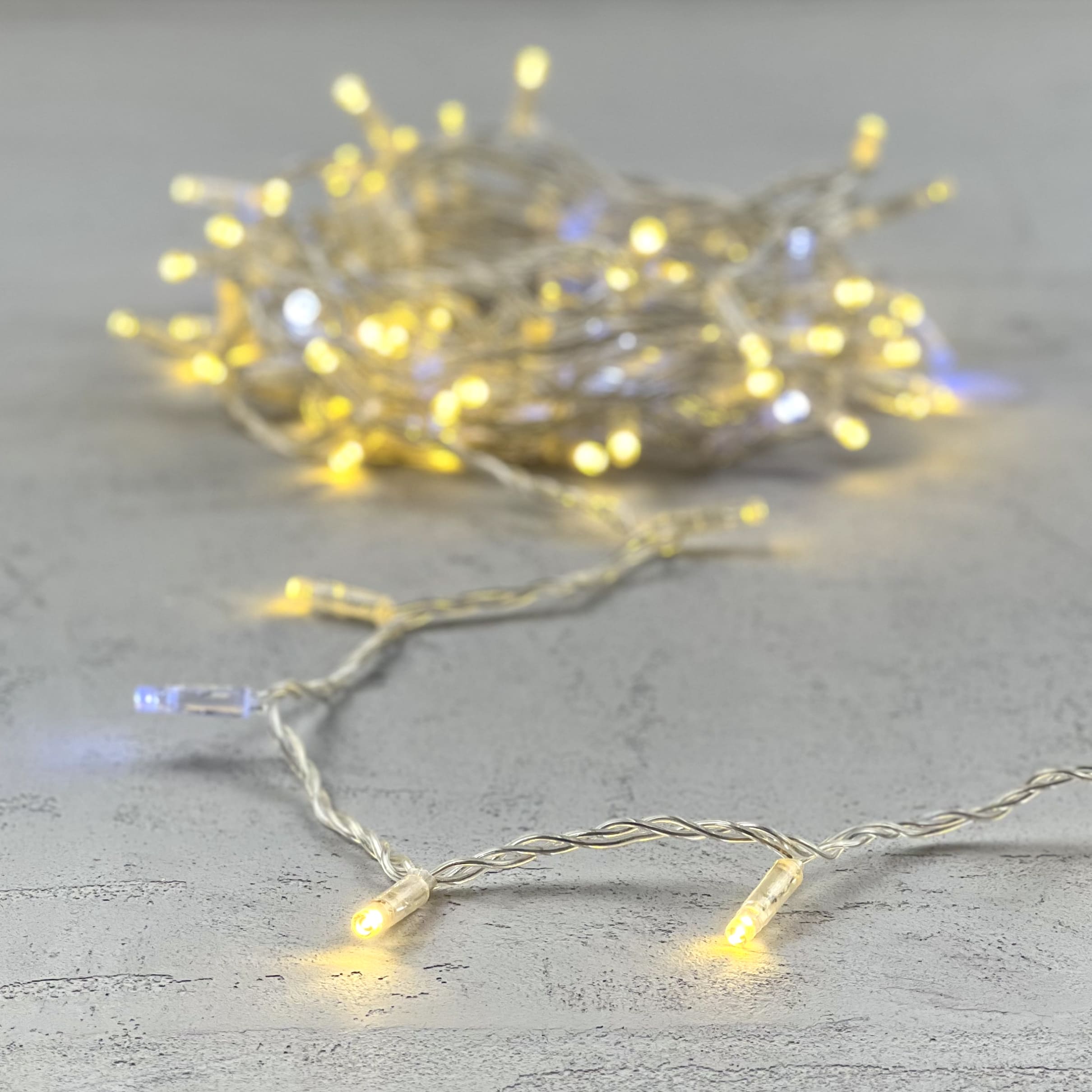 Гирлянда LTC Нить с Колпачком 10м Шампань с Мерцанием Белого Диода 24В, 100 LED PST100BLWCAP-10-1CH