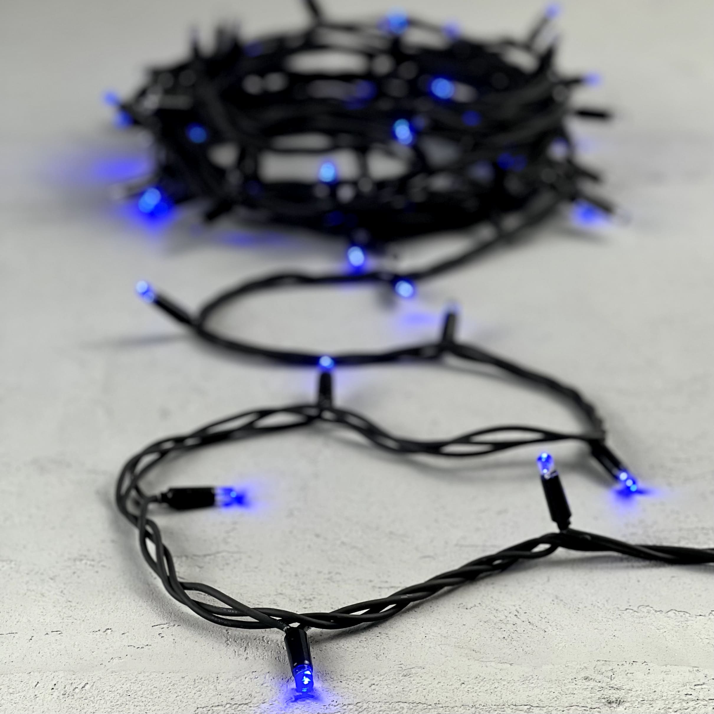 Гирлянда Нить 10м Синяя с Мерцанием Каждого Диода 220В, 75 LED, Провод Черный Каучук, IP65 LL75ABL-1-2B