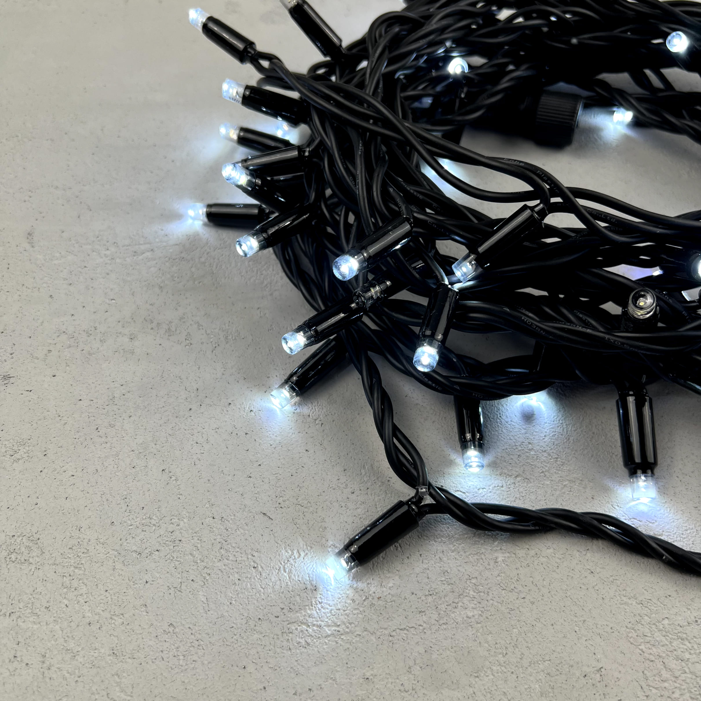 Гирлянда Нить 10м Белая с Мерцанием Белого Диода 220В, 75 LED, Провод Черный Каучук, IP65 LL75BLW-1-2W