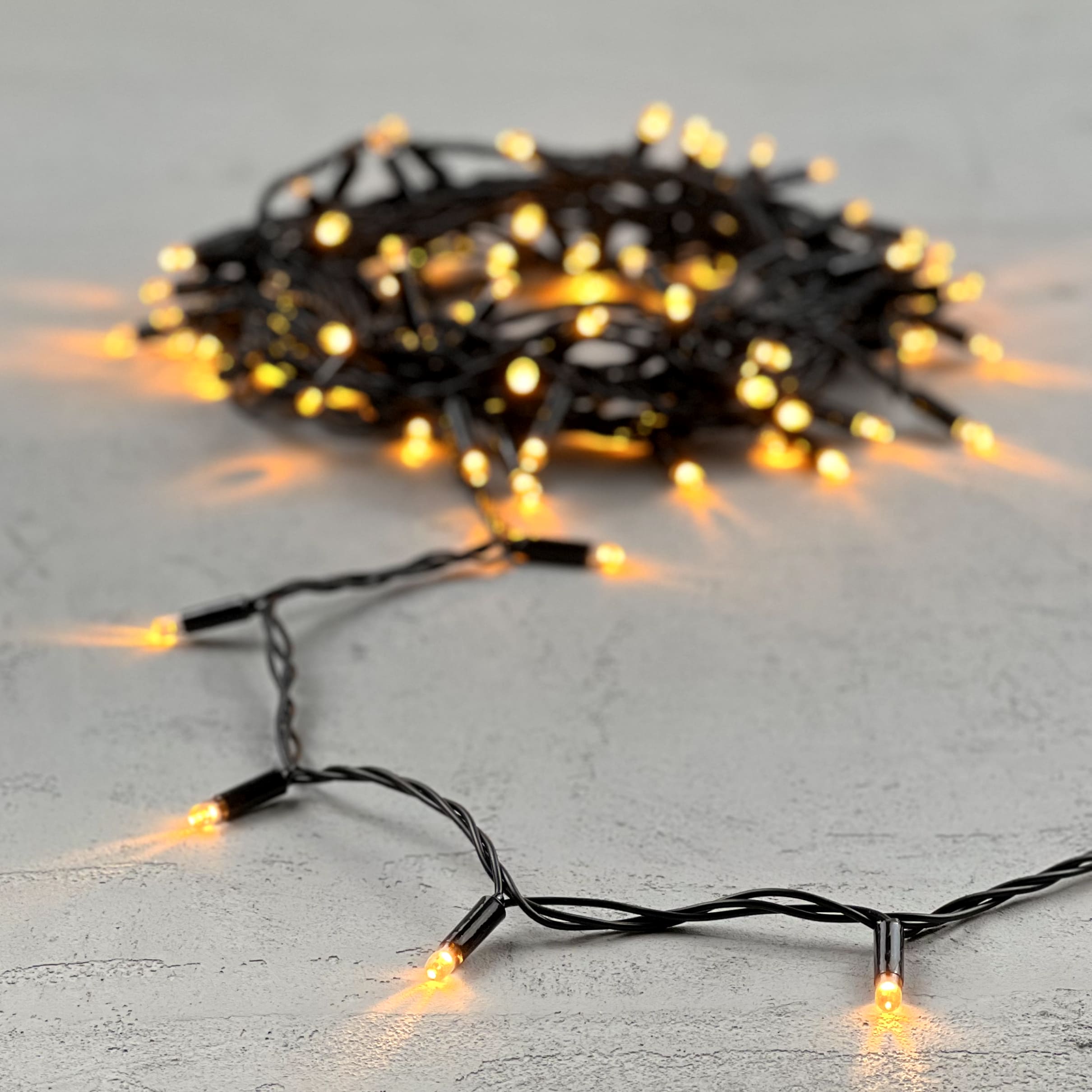 Гирлянда LTC Нить с Колпачком 10м Экстра Тепло-Белая 24В, 100 LED PST100CAP-11-1EWW