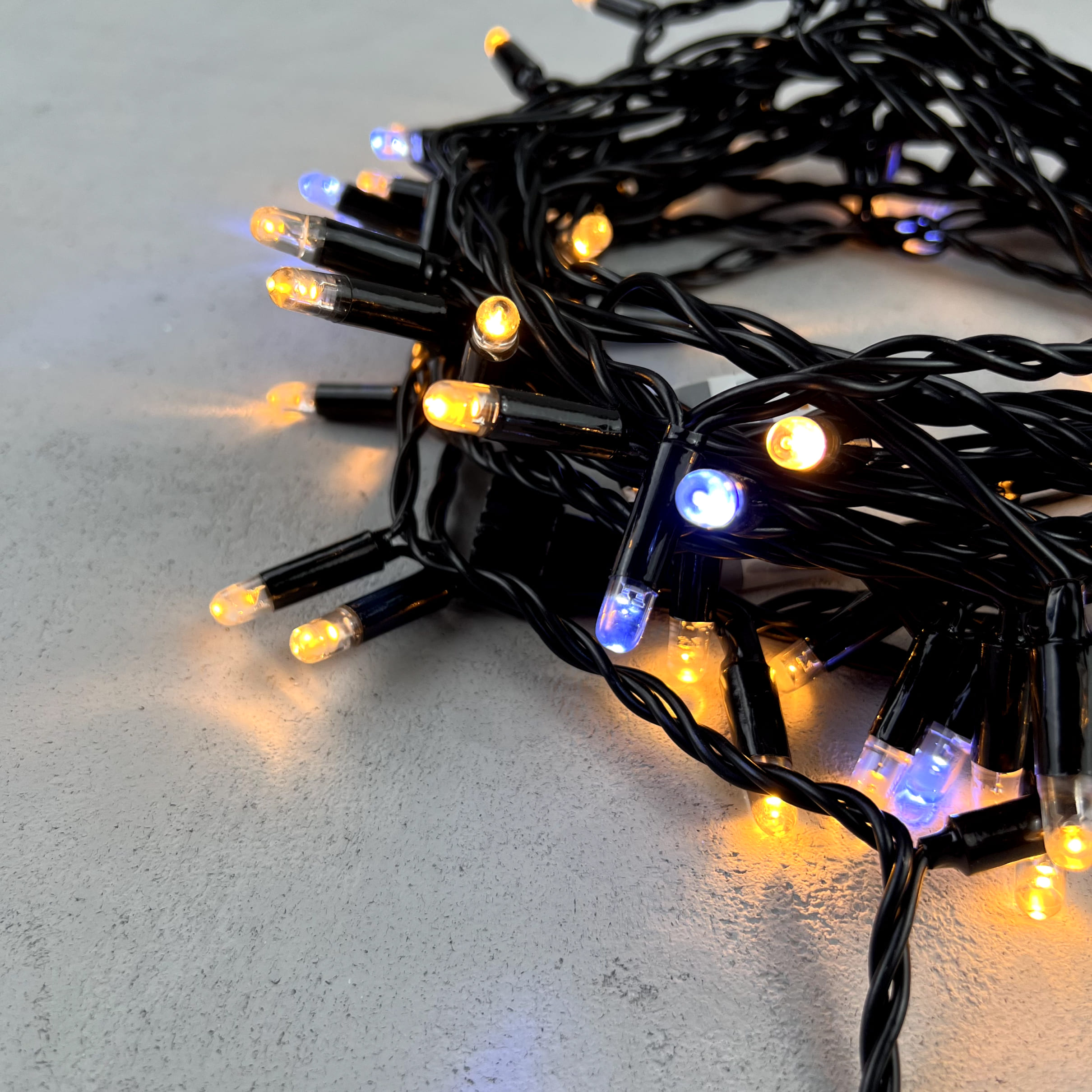 Гирлянда Нить с Колпачком 10м Экстра Тепло-Белая с Мерцанием Белого Диода 220В, 100 LED, Провод Черн LTC PST100BLWCAP-11-2EWW PST100BLWCAP-11-2EWW