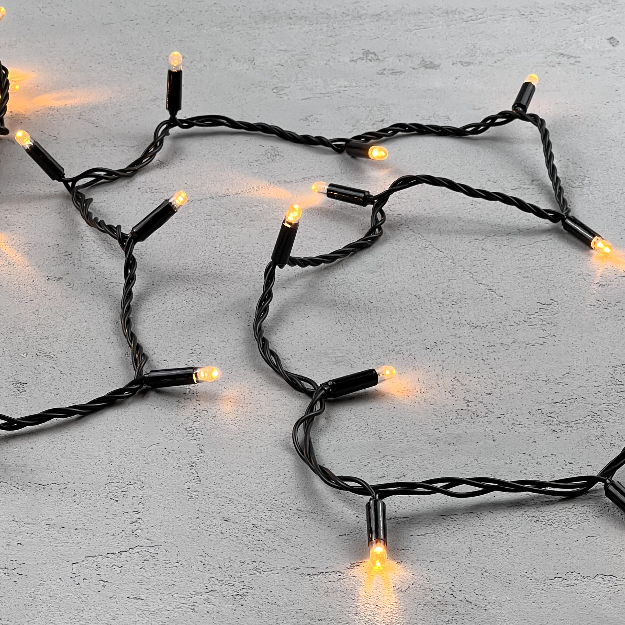 Гирлянда LTC Нить с Колпачком 10м Экстра Тепло-Белая 24В, 100 LED PST100CAP-11-1EWW