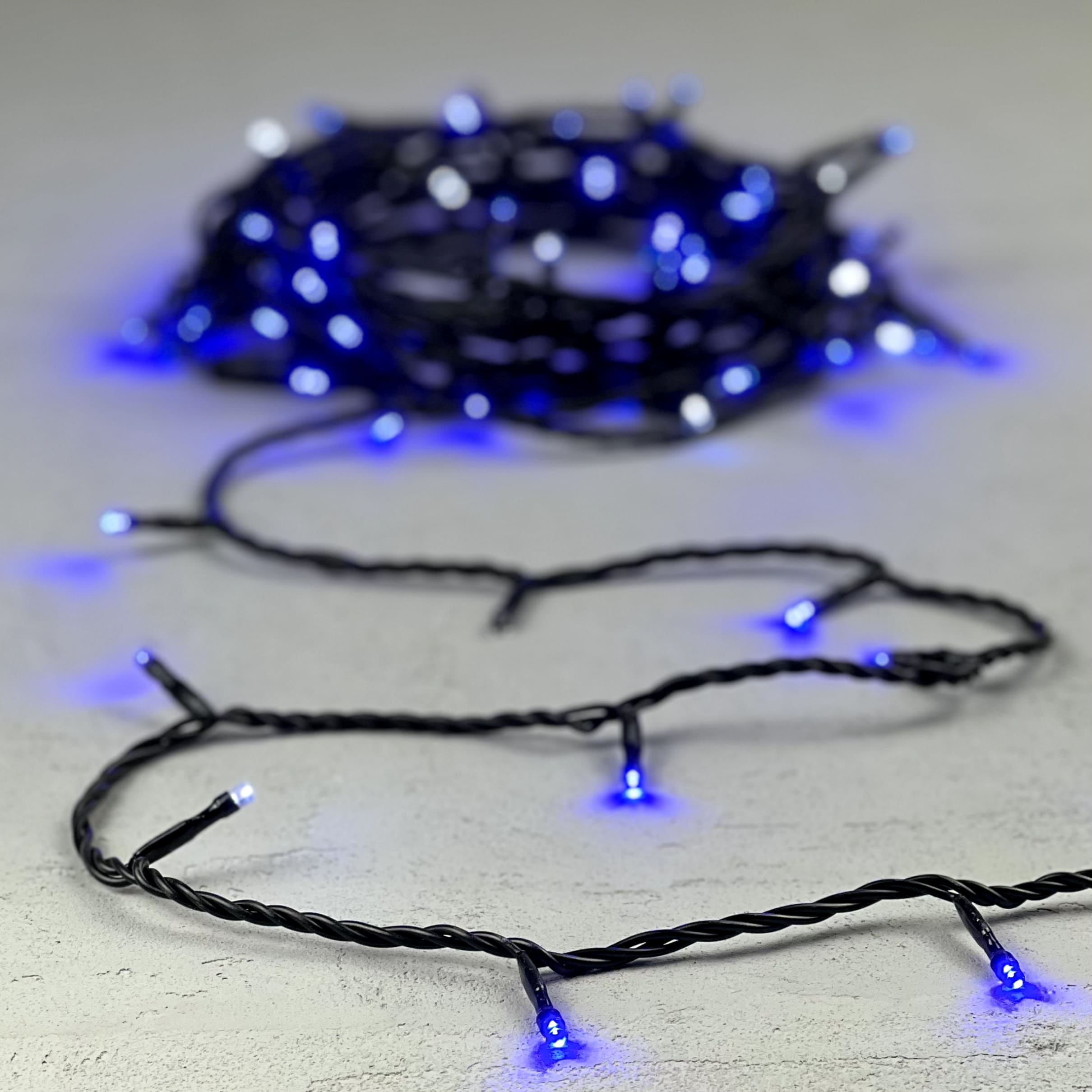 Гирлянда Нить 10м Синяя с Мерцанием Белого Диода 24В, 100 LED, Провод Черный ПВХ, IP54 PST100BLW-11-1B