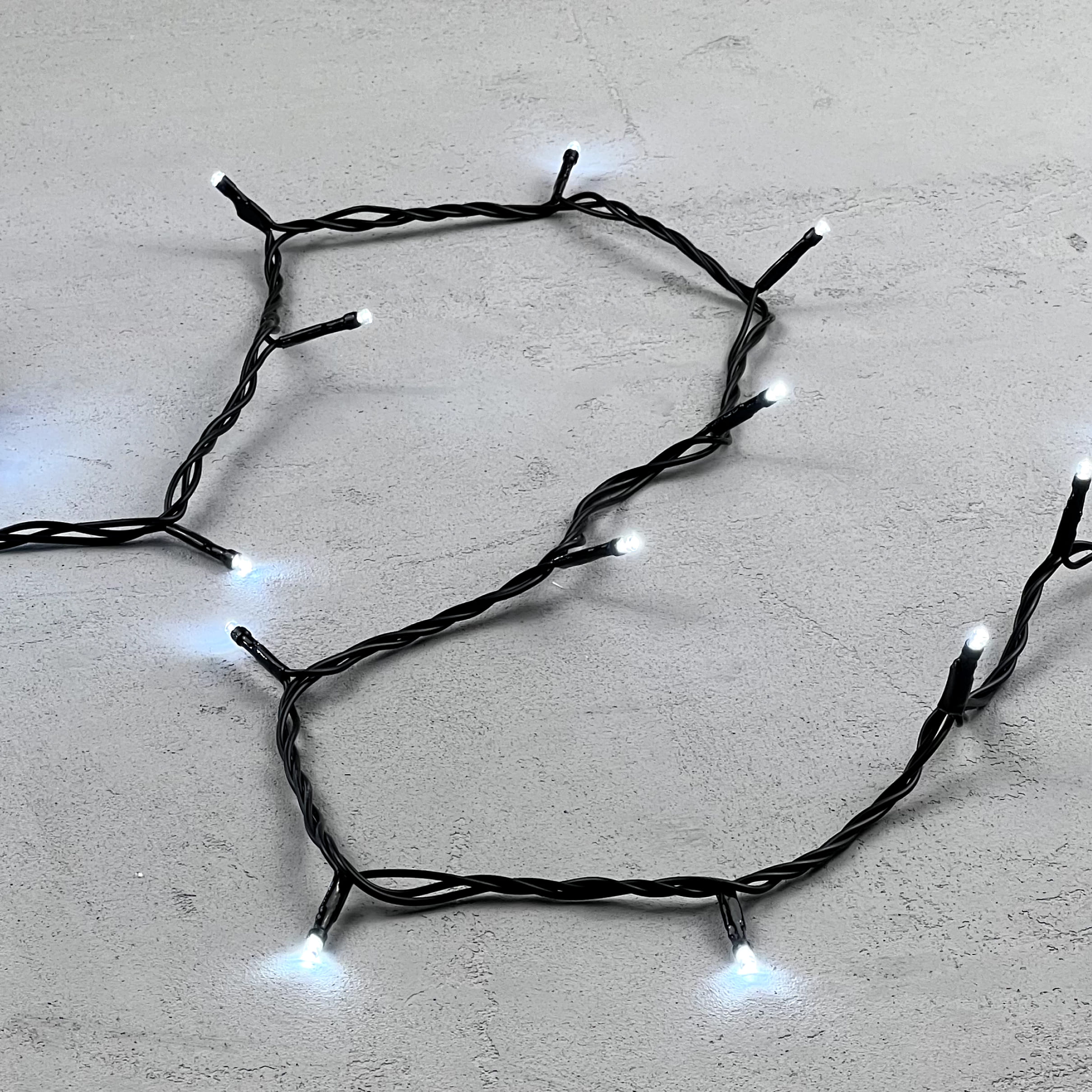 Гирлянда Нить 10м Белая 24В, 100 LED, Провод Черный ПВХ, IP54 PST100-11-1W